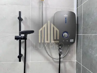 a soap dispenser on a wall in a bathroom at Residensi prima kampung paloh in Ipoh
