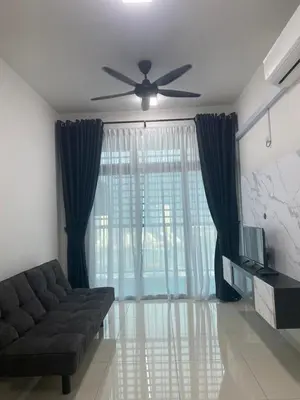 a living room with a couch and a ceiling fan at Prima Resident Meru Ipoh in Ipoh