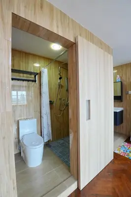 a bathroom with a toilet and a shower at Japan Comfort Lifestyle Hokkaido in Ipoh