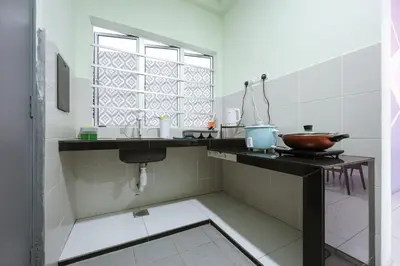 a kitchen with a sink and a window at Lavender Dream Brinchang Cozy Family 10 Pax Clover Home 8-01 in Brinchang
