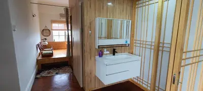 a bathroom with a white sink and a mirror at Japan Comfort Lifestyle Nagoya in Ipoh