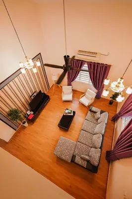 an overhead view of a living room with a couch at Dyra Homestay in Lumut in Lumut