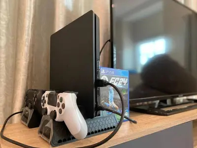 a video game controller sitting on top of a computer monitor at Dyra Homestay in Lumut in Lumut