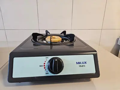 a toaster oven with a cookie on top of it at Ipoh Meru Landed Homestay TropiCasa 28 in Ipoh
