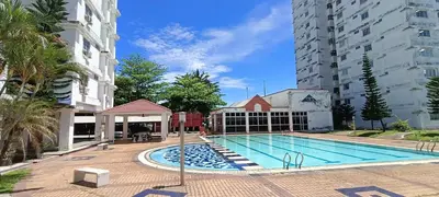 a swimming pool in the middle of a building at Japan Comfort Lifestyle Osaka in Ipoh