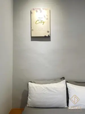 a bedroom with a sign above a bed with white sheets at Ipoh C Private Club House by Verve EECH109 in Ipoh