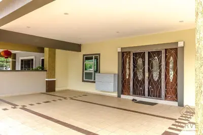 an empty room with a door with stained glass at Ipoh Lang Villa Premium Semi-D Villa by Verve in Ipoh
