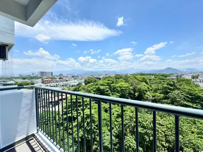 a balcony with a view of a city at The Paloh Town Suites 4R2B with 2 carpark by IWH Suites in Ipoh