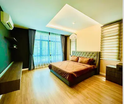 a bedroom with a bed and a large window at Large Family Villa Beach & Night Market Steps Away 20 Pax in Batu Ferringhi