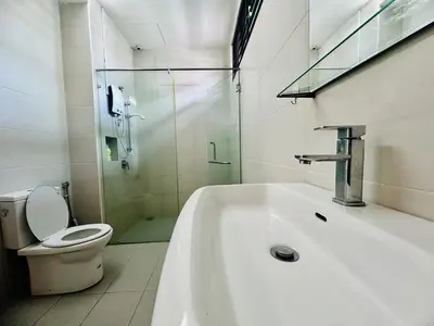 a bathroom with a sink and a toilet and a shower at Exclusive Luxury 2MIN Walk to Beach & Night Market in Batu Ferringhi
