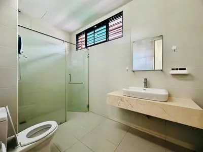 a bathroom with a toilet and a sink and a shower at Exclusive Luxury 2MIN Walk to Beach & Night Market in Batu Ferringhi