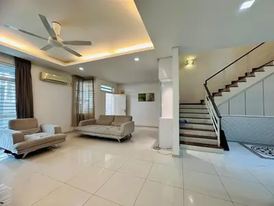 a living room with a ceiling fan and a staircase at Shamrock Bay Haven 5BR Homestay for 22pax at B Ferringghi in Batu Ferringhi