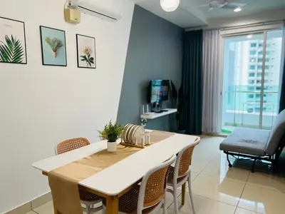 a dining room with a white table and chairs at Mansion One l 7 pax 2R2B l Cityview l Gleneagles l by PerfectSweetHome in George Town