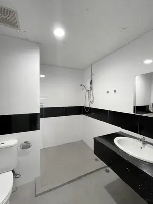 a bathroom with a toilet and a sink at Mansion One l 7 pax 2R2B l Cityview l Gleneagles l by PerfectSweetHome in George Town