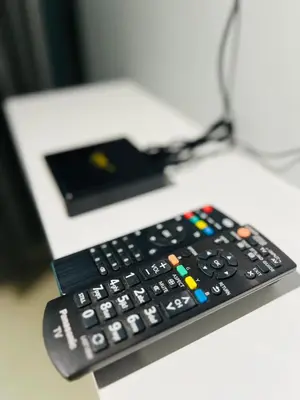 a remote control sitting on top of a desk at Mansion One l 7 pax 2R2B l Cityview l Gleneagles l by PerfectSweetHome in George Town