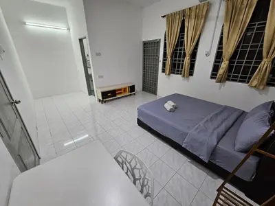 a bedroom with a bed in a room at Double S Hostel in Ipoh
