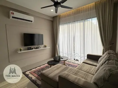 a living room with a couch and a large window at Verdant Sunset The Cove Ipoh in Ipoh