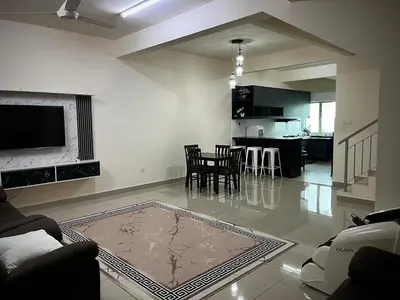 a living room with a couch and a table at Homestay Adyana in Raub