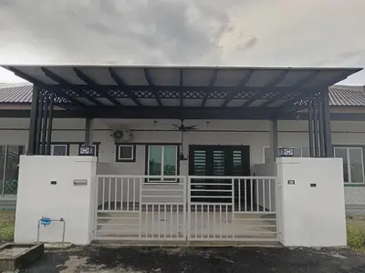 a pergola over a house with two refrigerators at Aleesa Homestay in Tapah