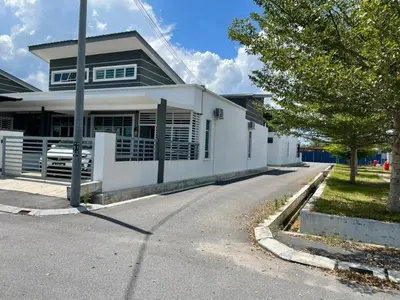 a white house with a road in front of it at Station 18 Homestay in Lahat