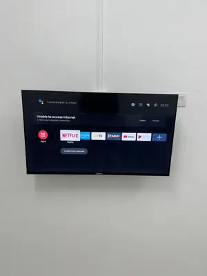 a microwave oven sitting on top of a wall at Raub homesty in Raub