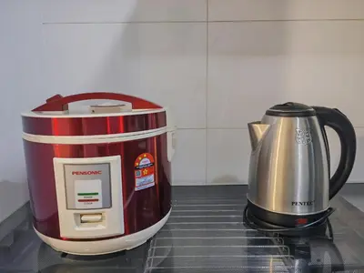 a coffee maker and a coffee pot on a counter at 142 spacious 3storey 6BR 6bath for big family wedding birthday easy parking in Gelugor