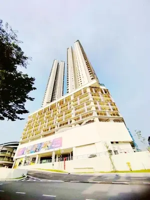 a tall white building with many windows at Taste of Home in Ipoh