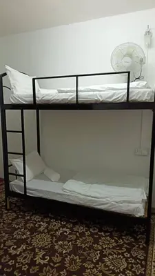 a couple of bunk beds sitting on top of a room at Cool view hotel in Tanah Rata