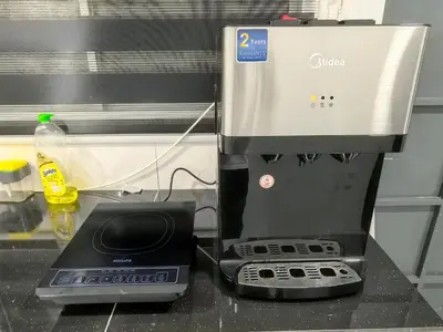 a coffee maker sitting on top of a counter at 32 Homestay in Teluk Intan