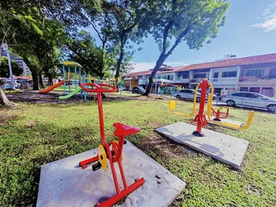a park with a playground with a slide at 45GeorgeTown Multi Family corner lot free parking food convenience stores nearby in George Town
