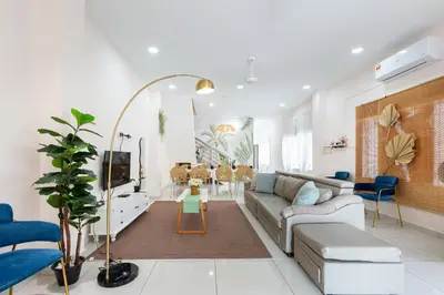 a living room with a couch and a tv at 45GeorgeTown Multi Family corner lot free parking food convenience stores nearby in George Town