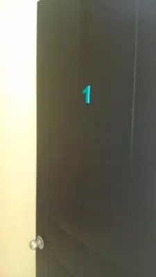 a door with the number on it in a bathroom at Dynamic homes stay in Ipoh