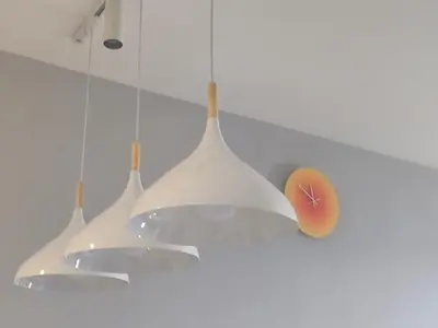 a chandelier hanging from a white ceiling at Iconic Regency Service Residences - Xin's Home in Bayan Lepas