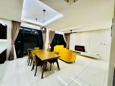 a dining room with a table and yellow chairs at Opulent Villa for 20pax BBQ, Steps to Beach Market in Batu Ferringhi