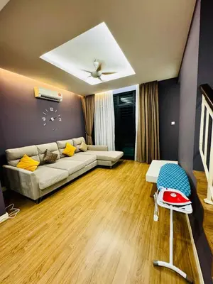 a living room with a couch and a table at Elegant20PaxVilla Perfect Location NearBeachMarket in Batu Ferringhi