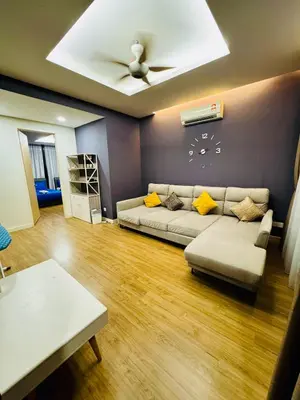 a living room with a couch and a ceiling at Charming Luxury Villa 20,BBQ, Close to Beach Shops in Batu Ferringhi