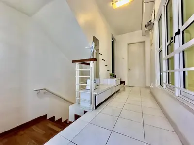 a bathroom with a sink in a room with a window at Cozy Homestay in Karpal Singh by 3C in George Town
