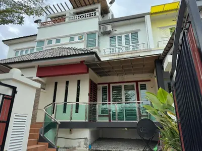 a house with a balcony in front of it at Cozy Homestay in Karpal Singh by 3C in George Town