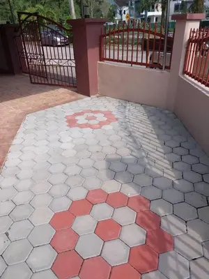 a tile floor with a design on the side of a building at Comfy21 Homestay Tambun, Ipoh in Ipoh
