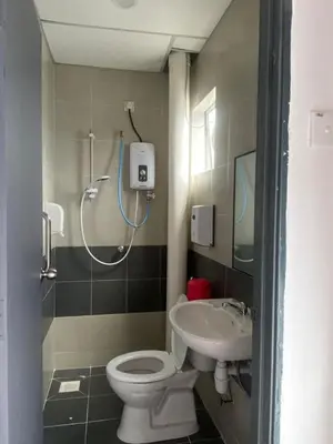 a bathroom with a shower and a toilet and a sink at Chillrex Homestay Just come over Chill & Relax in Brinchang