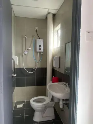 a bathroom with a shower and a toilet and a sink at Chillrex Homestay Just come over Chill & Relax in Brinchang