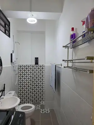 a bathroom with a toilet and a sink at Nature Beauty Homestay in Seri Iskandar