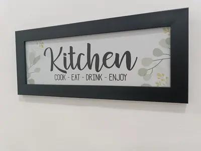 a framed picture of the word kitchen on a wall at 3Bedroom Landed Cozy Home Ipoh Netflix in Ipoh