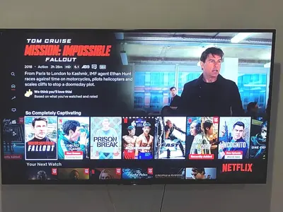 a television screen with a bunch of movies on it at Spacious 1BR 118 Island Plaza 4pax in George Town