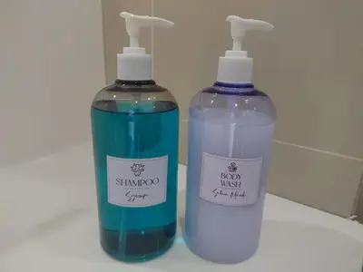 two bottles of soap sitting next to each other at Spacious 1BR 118 Island Plaza 4pax in George Town