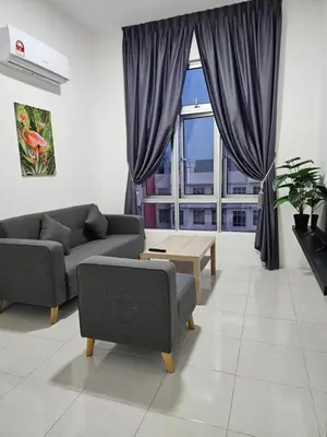 a living room with two couches and a table and a large window at Ipoh Town, Anderson Residence in Ipoh