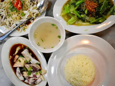 a group of plates of food on a table at Ipoh Town, Anderson Residence in Ipoh