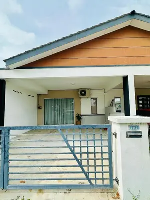 a house with a gate in front of it at Cozy All Four Bedroom with Aircond Stay wifi and Netflix in Kampong Bota Road