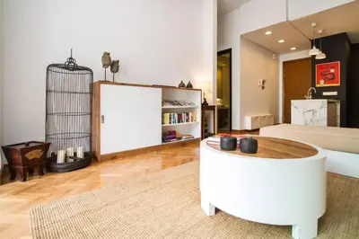 a living room with a couch and a coffee table at Dreame Home by The Quay in George Town