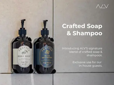 two bottles of soap and shampoo sitting next to each other at The Sun by Stellar ALV in Bayan Lepas